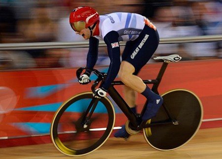 British cyclist Jason Kenny powered to victory over Frenchman Gregory Bauge in the men’s sprint in front of 6,000 baying fans