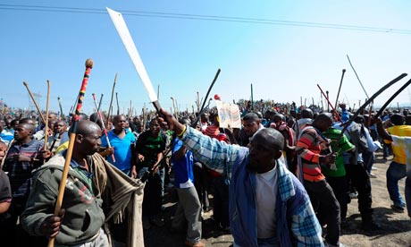 Miners arrested at Lonmin Marikana mine in South Africa will be charged later with the murder of 34 colleagues shot by police