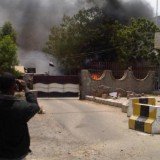 Suspected Al-Qaeda militants have attacked the intelligence headquarters of Yemen's southern city of Aden killing 14 people