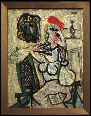 The Evansville Museum says Picasso glass artwork titled "Seated Woman with Red Hat" was donated to the museum in 1963
