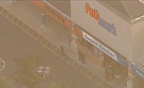 Three people have been shot dead after a gunman walked into a New Jersey Pathmark store and killed two staff members including an 18-year-old girl