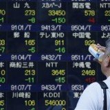 Asian markets have risen, following gains on Wall Street, after the US Federal Reserve unveiled its latest stimulus plan