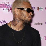 Chris Brown unveils new tattoo of a woman's battered and bruised face