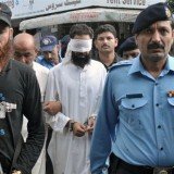 Imam Khalid Chishti has been remanded in custody, accused of planting pages of the Koran among burnt pages in the bag of a Christian girl held for blasphemy