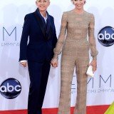 Portia de Rossi opted for something more masculine, posing with wife Ellen DeGeneres in an unusual Maison Valentino jumpsuit