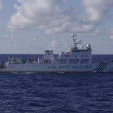 Six Chinese surveillance ships have entered waters near islands claimed by both Japan and China