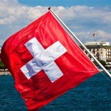 Swiss citizens are going to the polls to vote on a proposal to ban smoking completely in enclosed public places