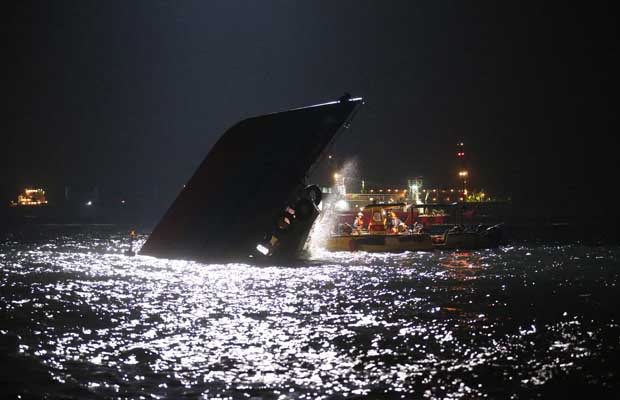 A rescue operation is continuing for passengers still missing five hours after a boat half-sank following Monday night's collision near Lamma island