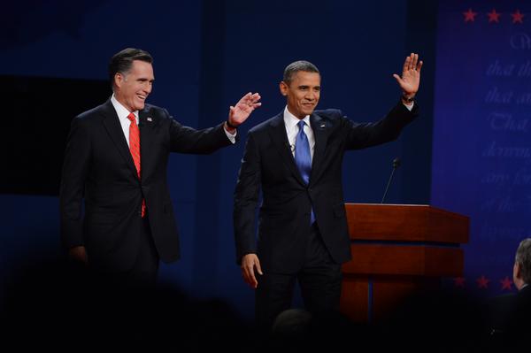 Barack Obama and Mitt Romney have clashed over their economic plans at Denver debate