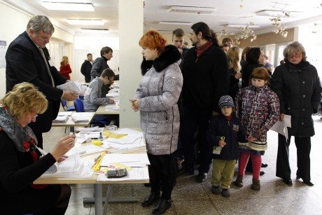Lithuania is voting in the second round of national elections, with budget cuts and joining the euro seen as key issues