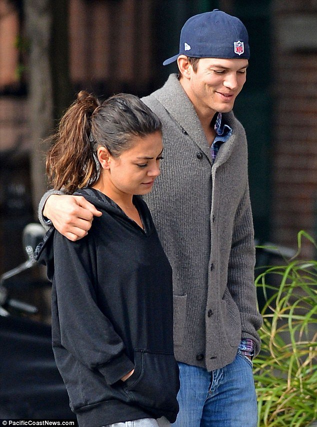 Mila Kunis appeared to have rolled out of bed in her pyjamas as she went on a coffee run with boyfriend Ashton Kutcher make-up free
