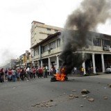 Panama's President Ricardo Martinelli says he cancels plans to sell off state-owned land in the duty-free zone of Colon, after violent protests