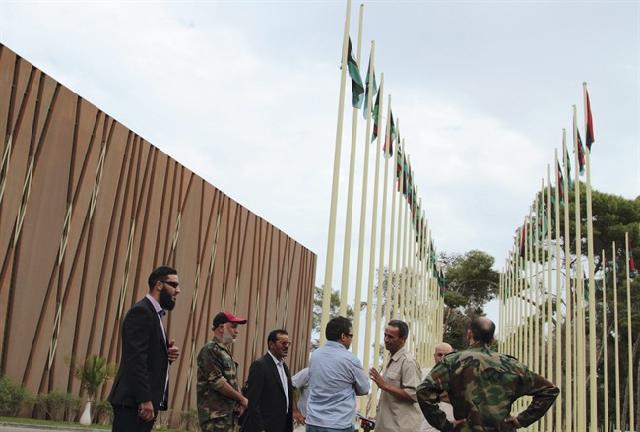 Dozens of militiamen have occupied Libya's parliament to register their anger over the formation of the new government