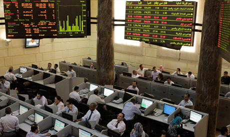 Egypt's stock market sees a plunge in its shares after President Mohammed Mursi granted himself sweeping new powers