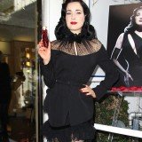 Dita Von Teese arrived late at her new fragrance Rouge launch event at Fred Segal