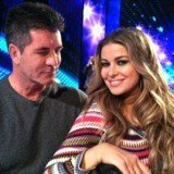 Simon Cowell has confirmed he is dating TV presenter and model Carmen Electra