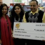 Urooj Khan pictured with wife Shabana Ansari, daughter Jasmeen and his $1 million winnings shortly before his death from cyanide poisoning