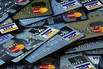 Eighteen people have been charged with stealing at least $200 million in a credit card fraud ring, possibly one of the largest in US history