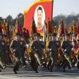 North Korea has commemorated late leader Kim Jong-il's 70th birthday with a military parade, pledges of loyalty to his son, Kim Jong-un, and thousands of red "kimjongilia" begonias