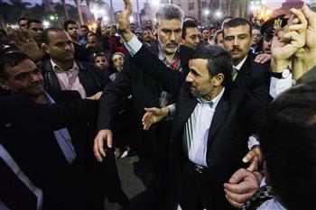 Security guards have seized a man who tried to hit Iran’s President Mahmoud Ahmadinejad with a shoe as he visited a mosque in the Egyptian capital Cairo