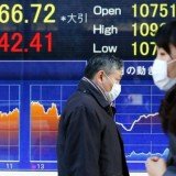 Asian stock markets have continued a global rally after New York's main Dow Jones share index hit a historical record high