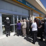 Cypriot banks opened on Thursday, March 28, for the first time in nearly two weeks amid severe new rules imposed as part of the bailout deal