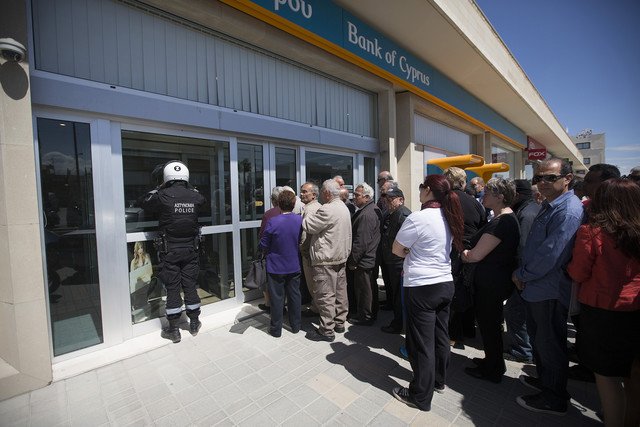 Cypriot banks opened on Thursday, March 28, for the first time in nearly two weeks amid severe new rules imposed as part of the bailout deal