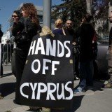 Cypriot political leaders have dropped the unpopular levy on bank deposits in a new bailout plan