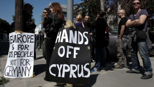Cypriot political leaders have dropped the unpopular levy on bank deposits in a new bailout plan