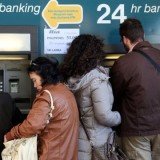 Cyprus' parliament vote on bailout deal that has sparked huge public anger has been delayed until Tuesday