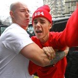 Justin Bieber has lashed out at a photographer in a foul-mouthed rant just hours after leaving hospital