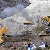 Tibetan rescue teams are searching for 83 miners buried in a landslide in Maizhokunggar county