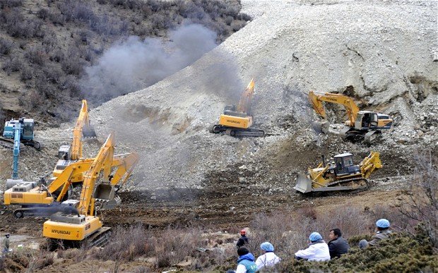 Tibetan rescue teams are searching for 83 miners buried in a landslide in Maizhokunggar county