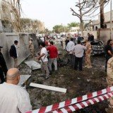 A car bomb has exploded outside the French embassy in the Libyan capital Tripoli, wounding two guards and causing extensive damage