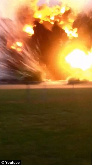 A man accompanied by his child has captured the moment of the huge explosion at West Fertilizer plant in Texas