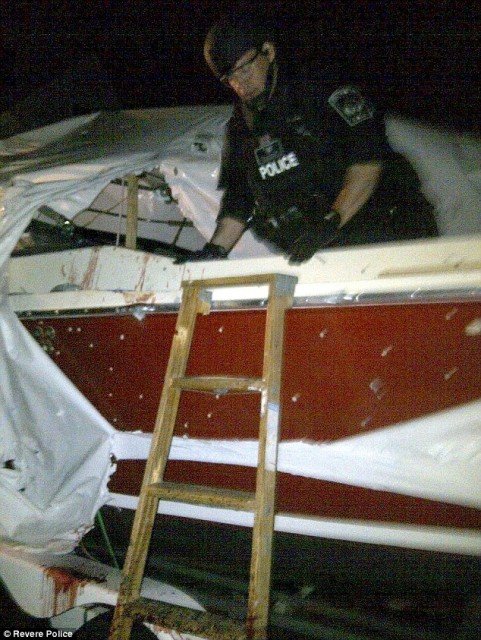 A newly released photo of David Henneberry’s boat, where Boston bombing suspect Dzhokhar Tsarnaev was discovered, shows a bloodied, bullet-ridden port side