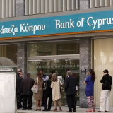 Eurozone finance ministers meet in Dublin to finalize Cyprus bailout amid news that it needs much more money than first thought