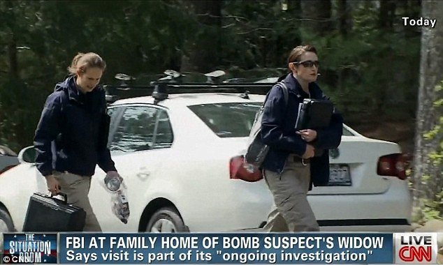 FBI agents investigating the Boston bombings visited the North Kingstown home of Katherine Russell's parents, where Tamerlan Tsarnaev's widow has been staying since the attacks
