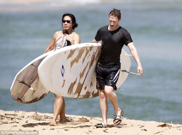 Frugal billionaire Mark Zuckerberg continues to enjoy his budget holiday in Hawaii with his wife Priscilla Chan, while it has been revealed he is even richer than previously thought