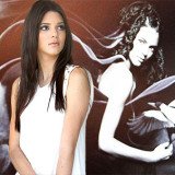 Kendall Jenner posed like a pro as she got a glimpse at her portrait in the Nomad Two Worlds exhibit at the Guy Hepner art gallery in Los Angeles