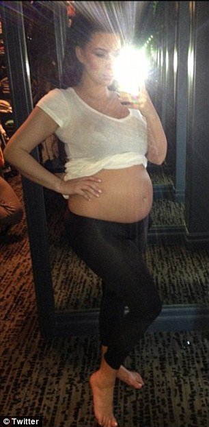 Kim Kardashian wanted to assert her new status as mother-to-be with a Twitter picture of her pregnant belly 