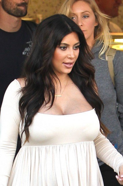 Kim Kardashian's bra size has gone up to F while she is concerned that she won't be able to lose the baby weight 