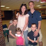 Martin Richard, right, pictured with his mother Denise, sister Jane, older brother Henry and father Bill