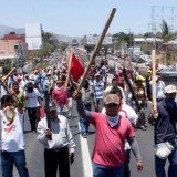Mexican teachers incensed by sweeping education reforms have attacked the buildings of political parties in the south-western state of Guerrero