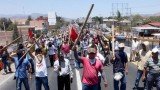 Mexican teachers incensed by sweeping education reforms have attacked the buildings of political parties in the south-western state of Guerrero