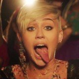 Miley Cyrus took to Twitter late Friday night with a series of snaps displaying her newly acquired rocker look
