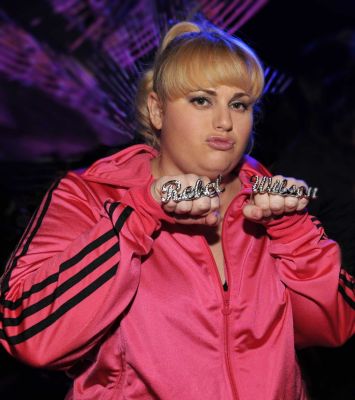 Rebel Wilson paid reverence to her Australian roots as she thrashed out a bizarre musical number to kick-off the 2013 MTV Movie Awards 