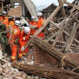 Rescue teams in China are struggling to reach survivors of 6.6-magnitude earthquake that killed 203 and injured some 11,500 in Sichuan province