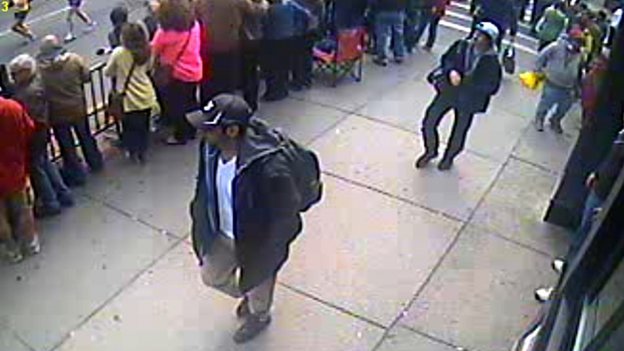 The FBI has released photos and video of two suspects they want to identify as part of the investigation into Monday's Boston Marathon bombings