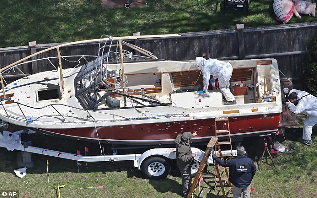 Two unnamed US officials have told the AP that Dzhokhar Tsarnaev was unarmed when police captured him hiding inside the boat 